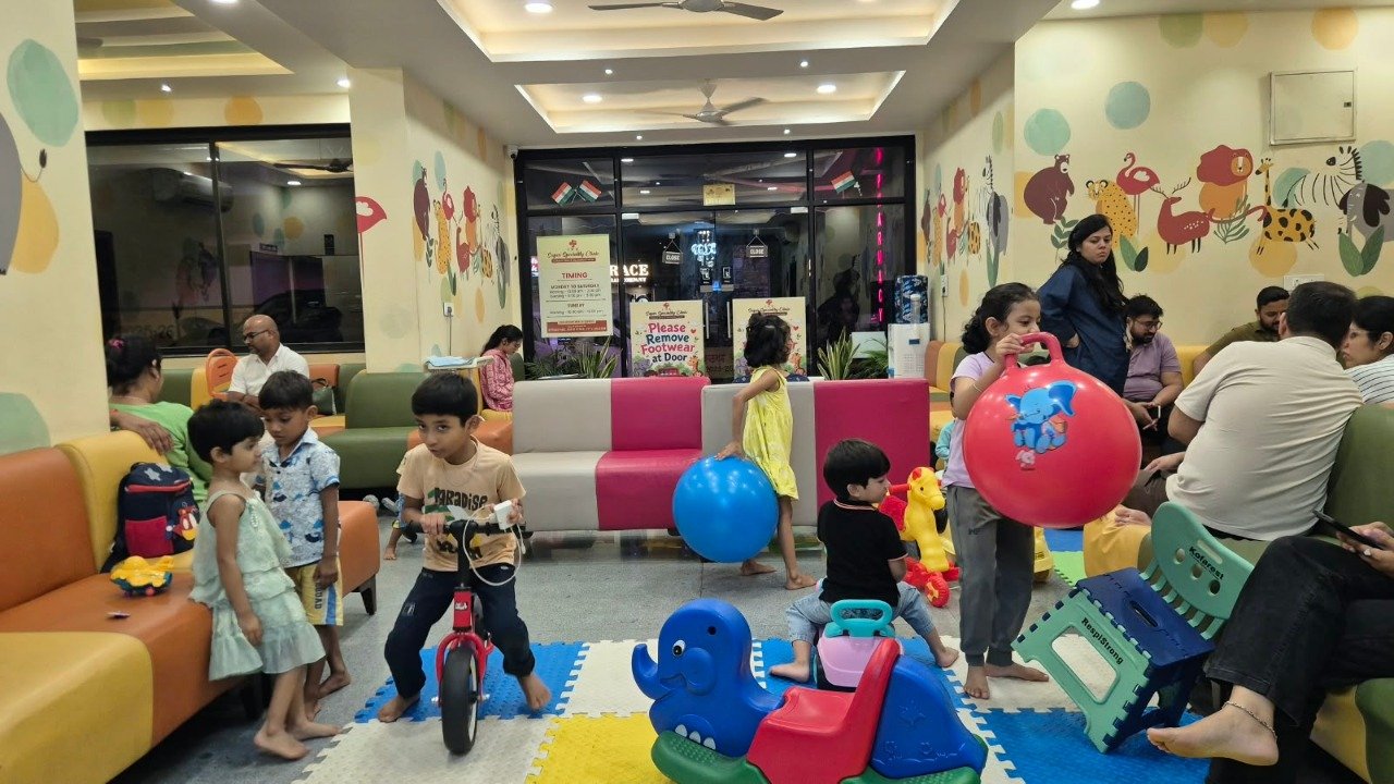 Children playing with toys in the clinic waiting area